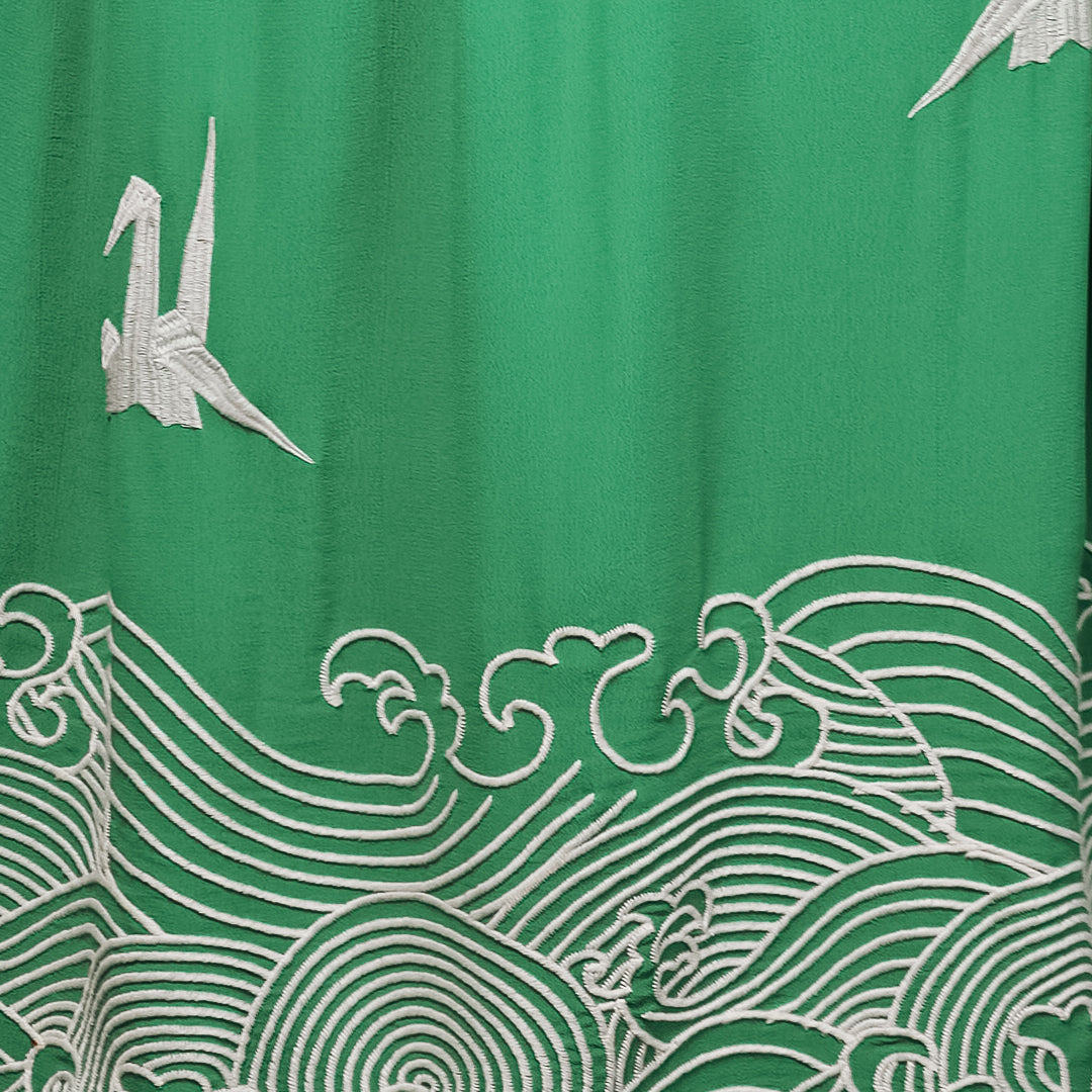 Hokusai wave and origami birds embroidery detail