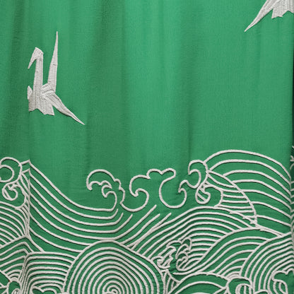 Hokusai wave and origami birds embroidery detail